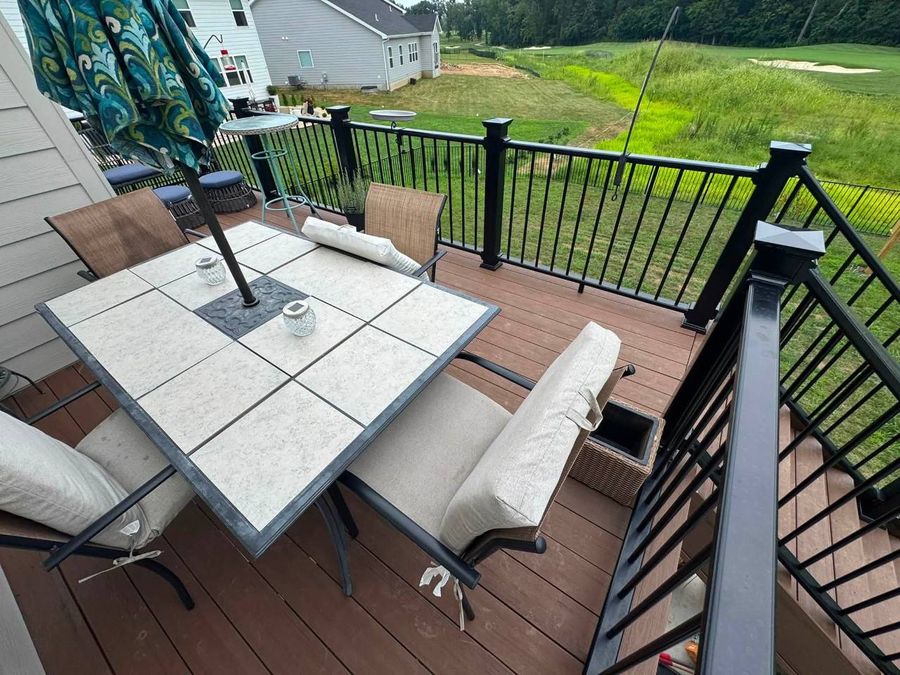 TimberTech Brown Oak deck furnished for outdoor dining