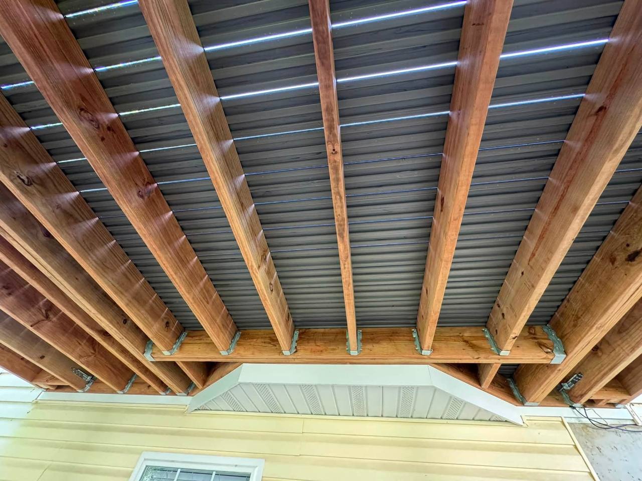 Under-deck drainage installed between the deck joists